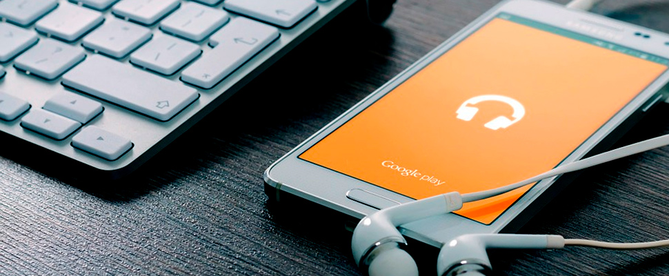 Smart phone and headphones on the table 