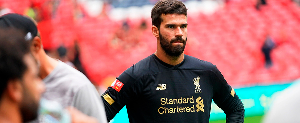 Liverpool's goalkeeper Alisson Becker reacts after the FA Community Shield soccer match at Wembley Stadium in London