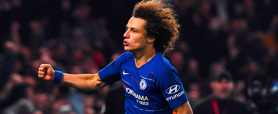 Chelsea David Luiz celebrates scoring the winning penalty during the Carabao League Cup semi final