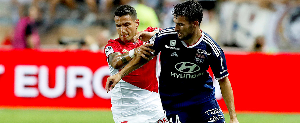 Rony Lopes (L) of AS Monaco and Leo Dubois (R) of Olympique Lyon in action during the French Ligue 1 soccer match