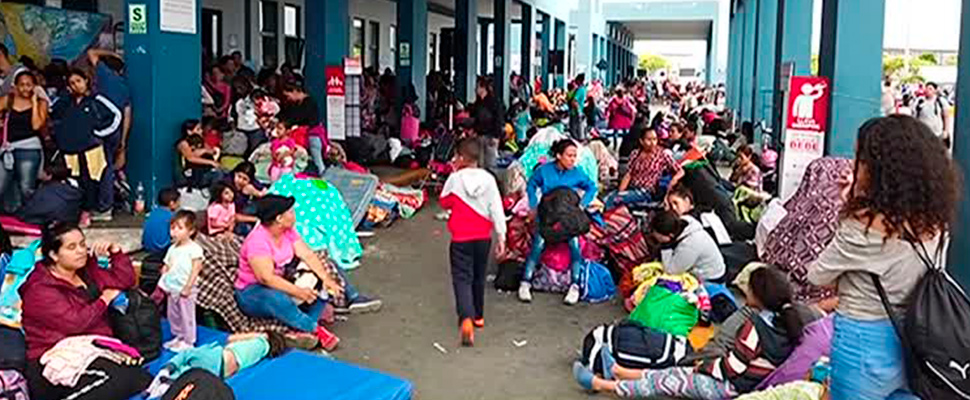 Venezuelan migrants at a registration and migration post at the border.