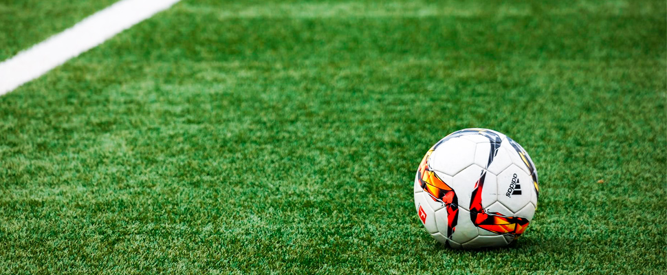 Soccer ball in a grass field.