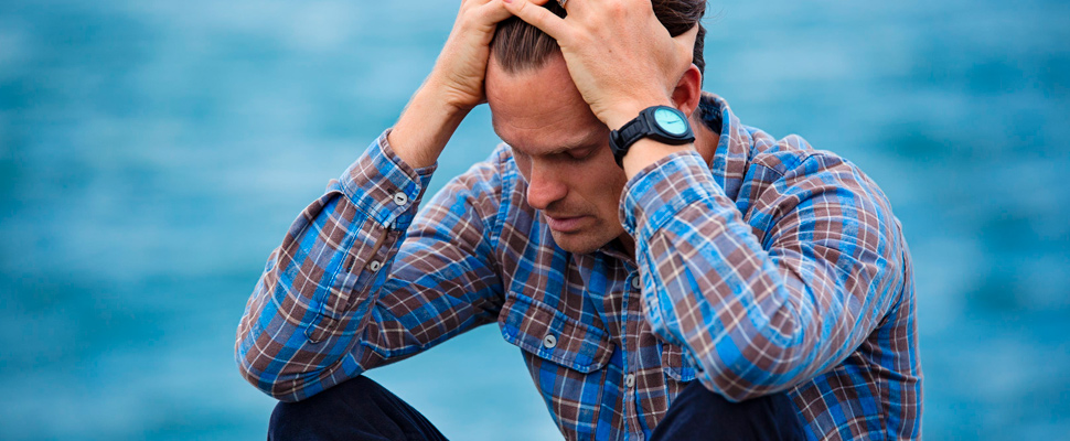 Man touching his hair.