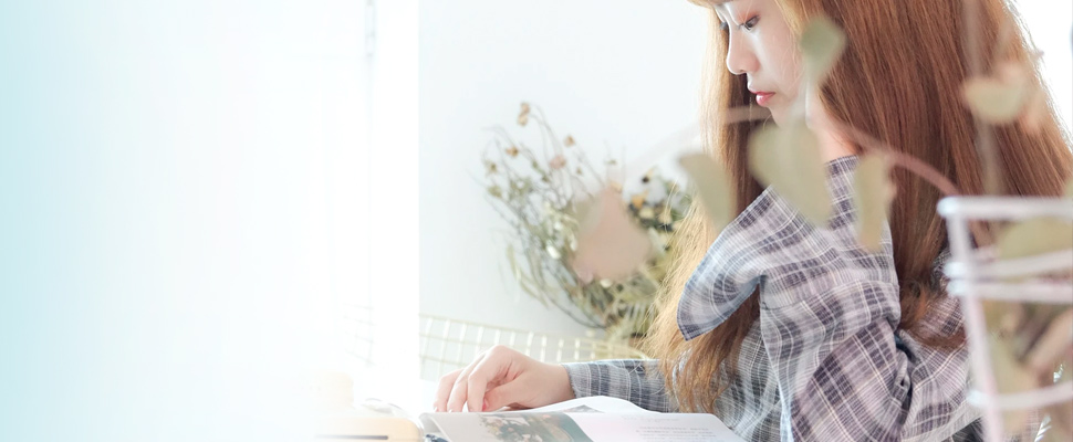 Woman reading a book.