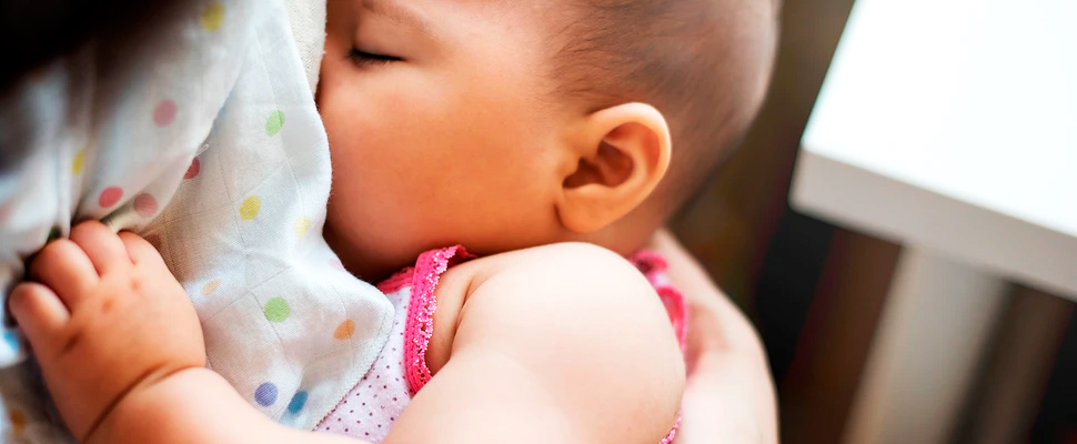 Mother breastfeeding her baby.