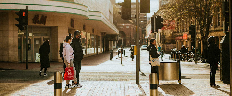 People waiting to cross the street