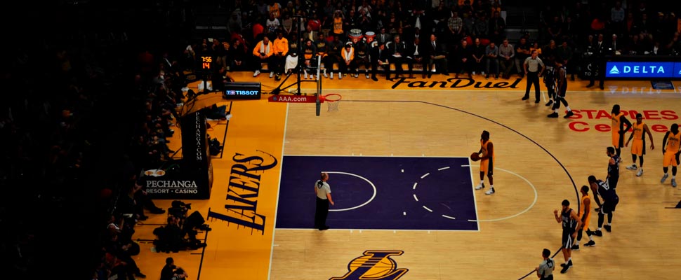 Lakers player taking a free kick.