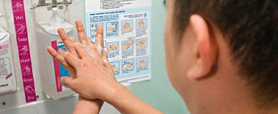 Healthcare worker washing hands.