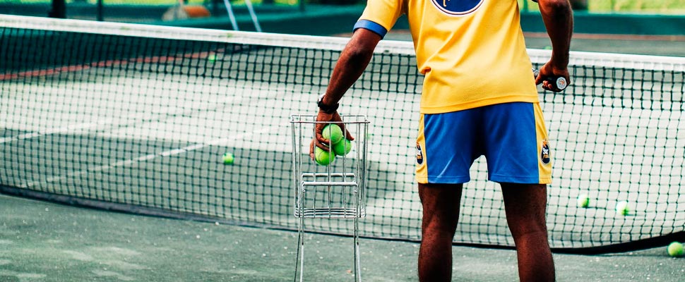 Man playing tennis.