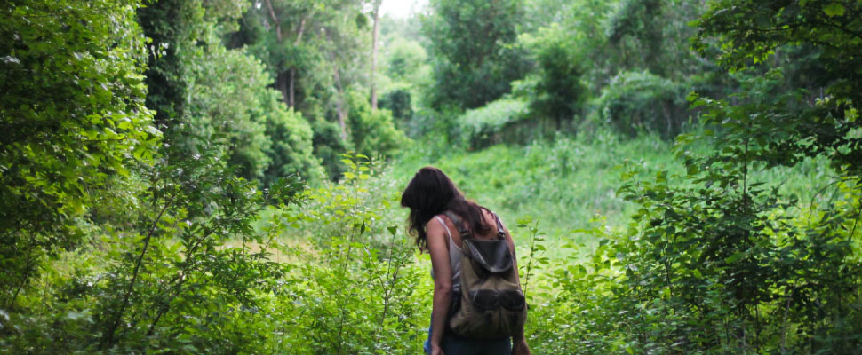 Woman walking in natural park