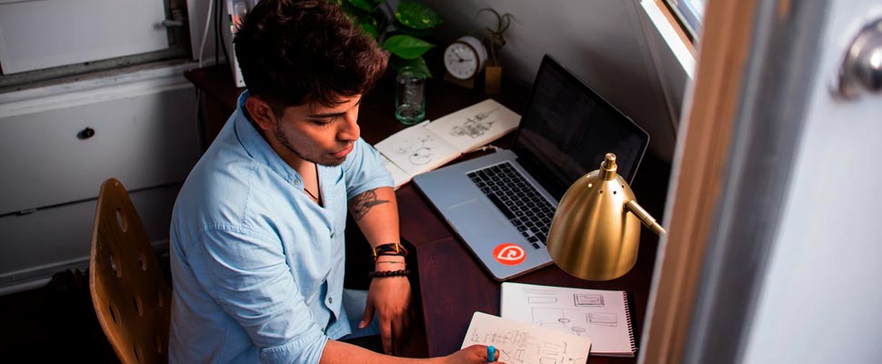 Man sitting in front of a computer