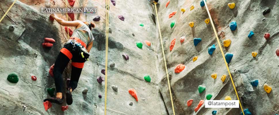 Woman practicing rock climbing