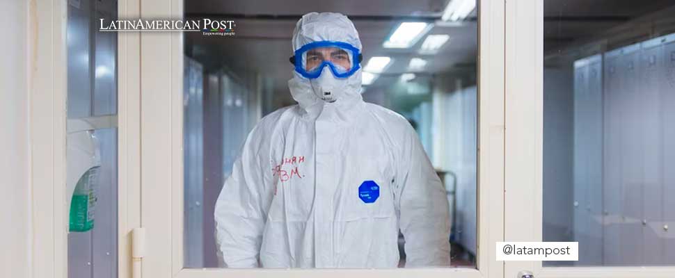 Person wearing a biosafety suit