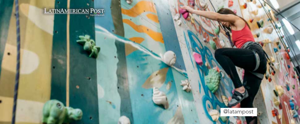 Woman training on climbing wall