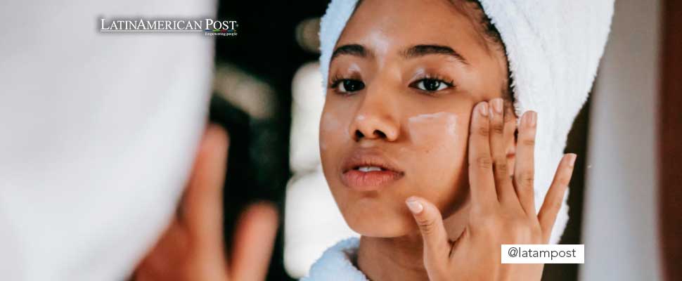 Woman applying a face mask