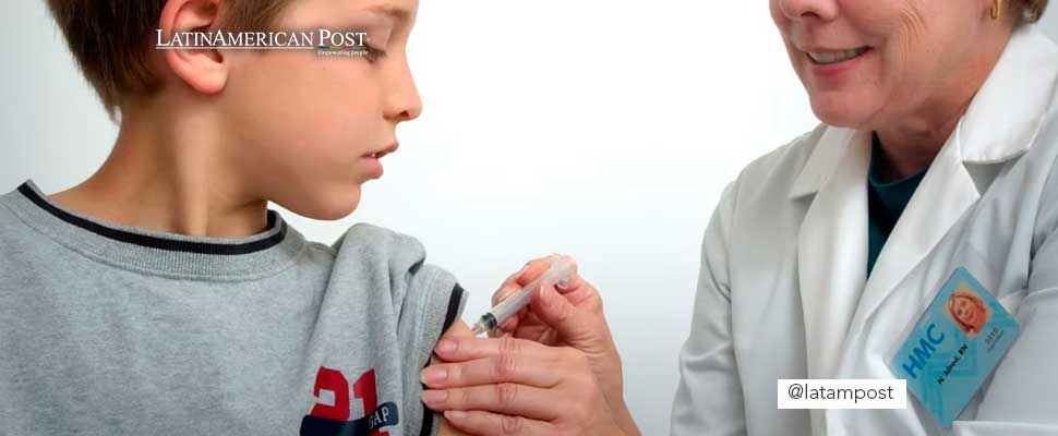 Woman injecting a child