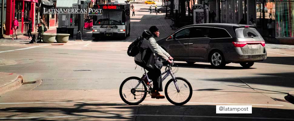 Man riding a bicycle on a street