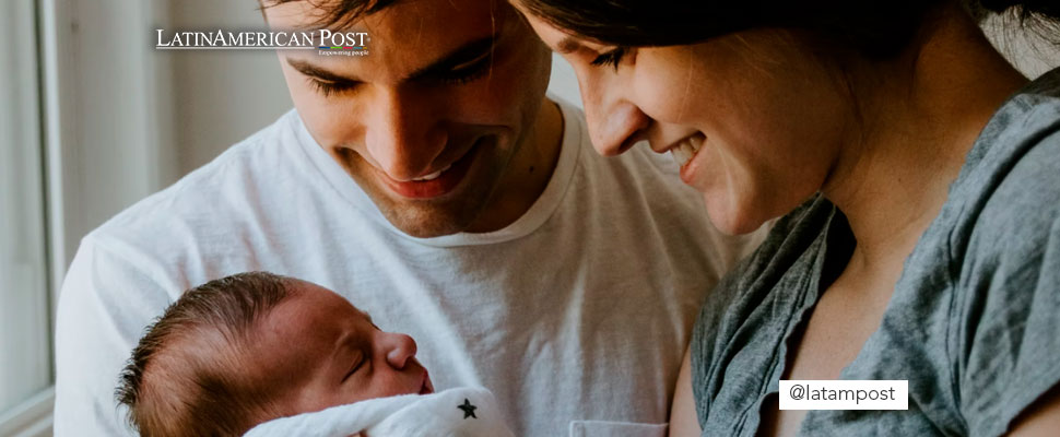 Parents holding their newborn baby