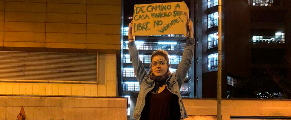 Woman with a banner at a protest