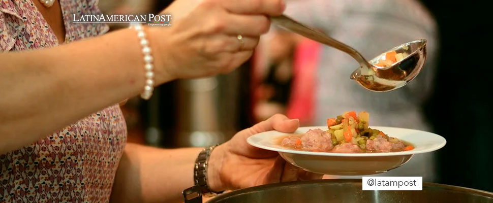 Person serving food on a plate