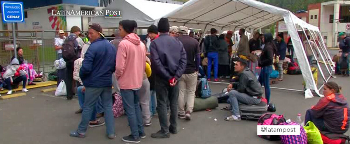 Migrants at a border with Ecuador