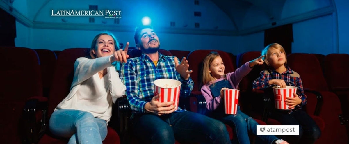 People in a movie theater watching a movie