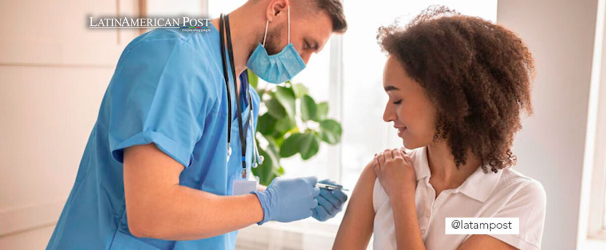 Doctor vaccinating a patient