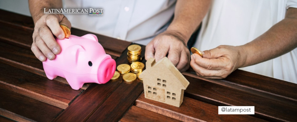 Senior couple with coins and a piggy bank