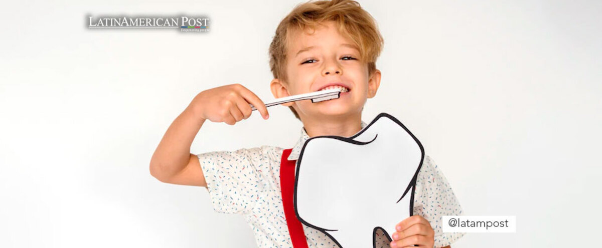 Boy with a toothbrush and a tooth figure