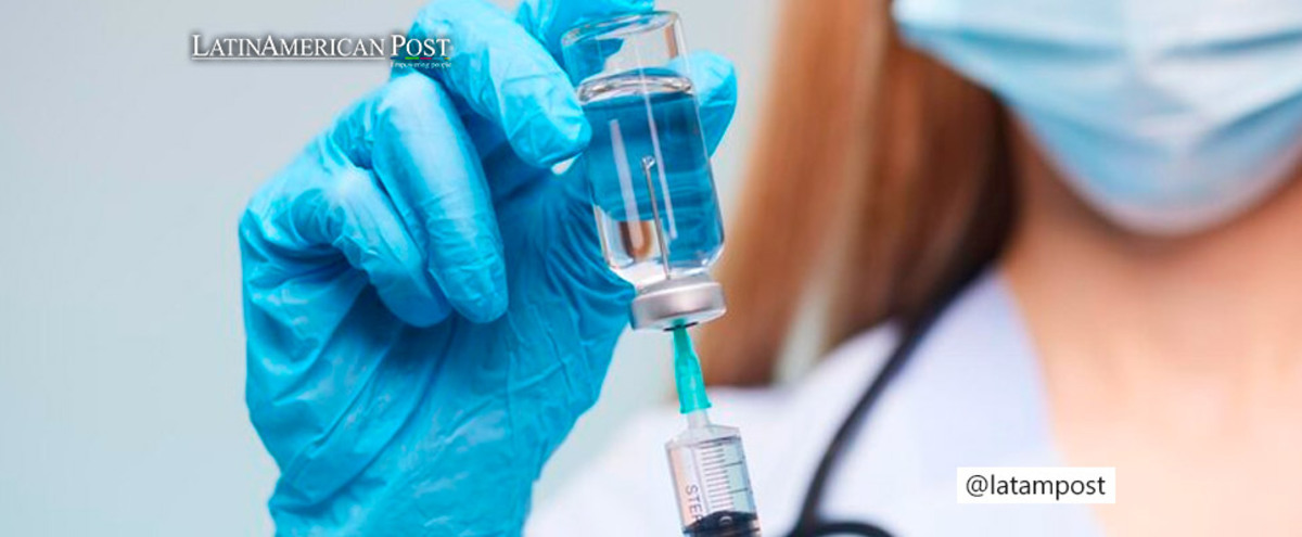 Doctor with a vaccine in hand