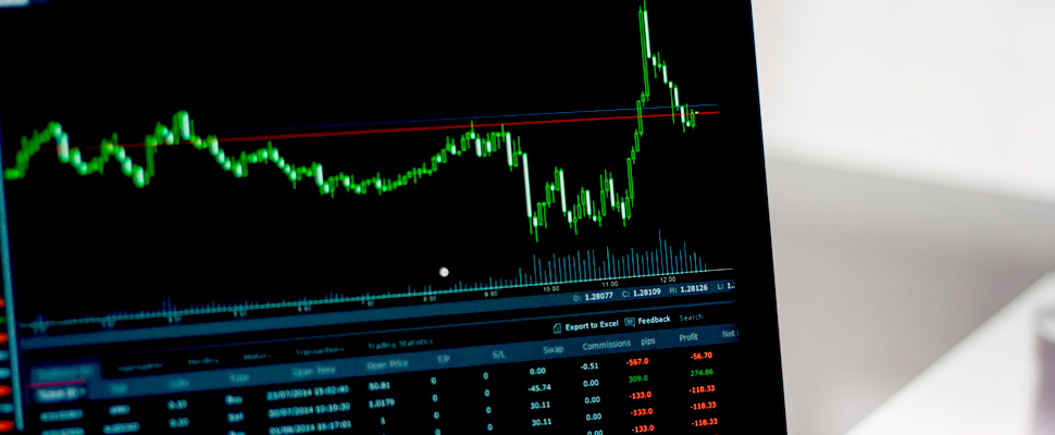 Computer showing stock charts