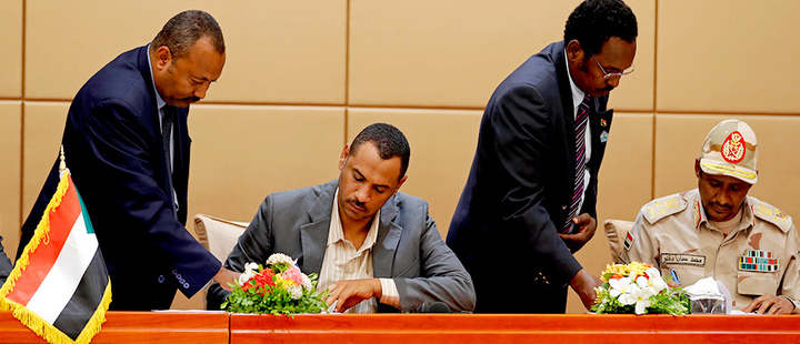 Sudanese protesters sign power-sharing deal with military Sudanese protesters sign power-sharing deal with military